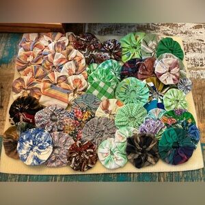Handmade vintage Fabric Yo-Yo Quilt Pieces, total of 50!